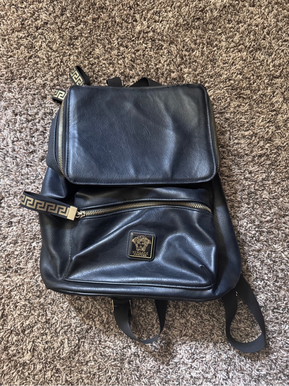 Versace Black Leather Backpack with Gold Accents